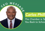Graphic reading "August CEO Message: Carlos Phillips - The Chamber is Taking You Back to School"