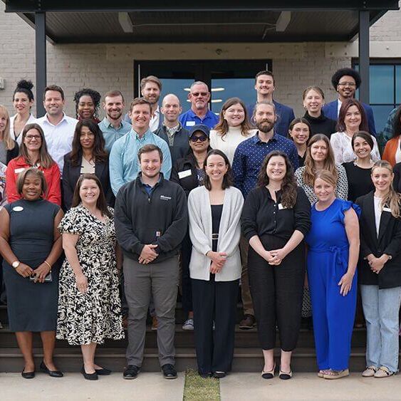 Opportunity Greenville group photo outside a building entrance